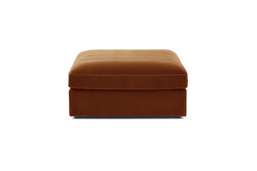 The Halo ottoman in modular living room setup

